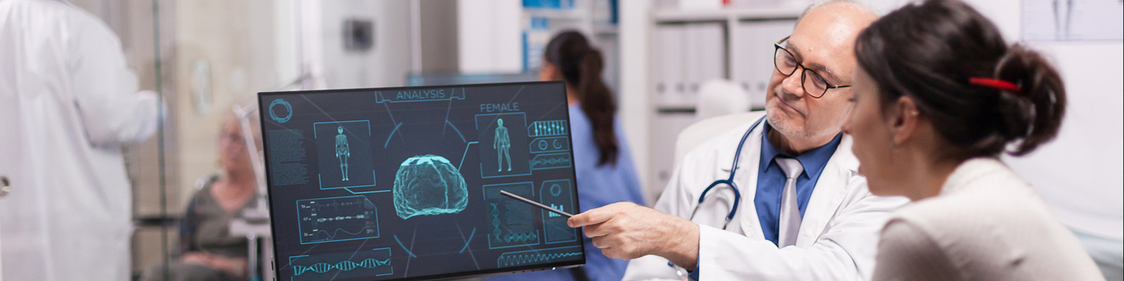 bigstock-Mature-Doctor-Explaning-X-ray--383518229